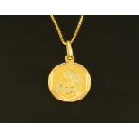 A 9 ct gold circular pendant, with link chain, gross weight 6.1 grams.