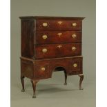A mid 18th century oak chest on stand,