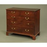 A George III mahogany chest of drawers,