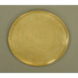 A large Islamic brass tray, circular diameter 78 cm.