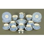 A Royal Crown Derby blue and white tea service, comprising 7 cups, 7 saucers, 9 plates, 2 basins,