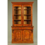 A Victorian mahogany bookcase in two sections,