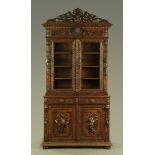 A 19th century oak Flemish style bookcase,