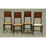 A set of four Arts and Crafts oak dining chairs by William Birch,