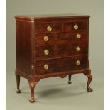 A late 19th/early 20th century mahogany chest on stand,