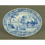 An early 19th century Davenport oval bowl, with dog rose border and fishing scene,