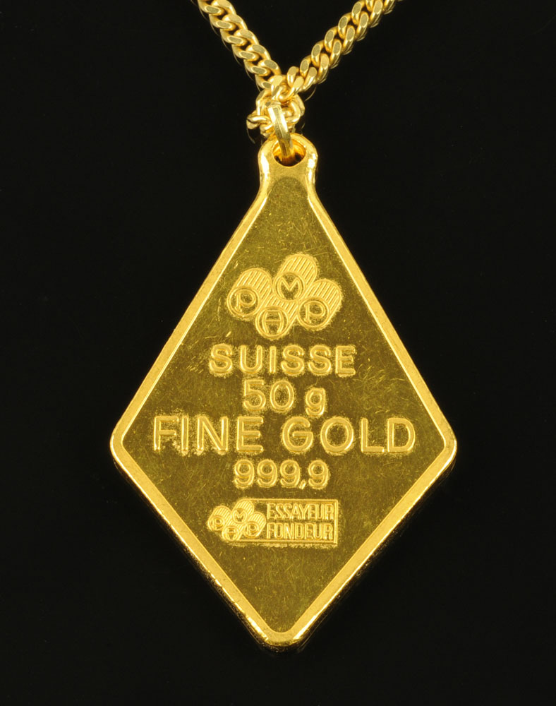 A "Suisse 50 gram fine gold 999.