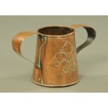A 19th century French copper two handled vessel, relief moulded with a fleur de lis and rose,