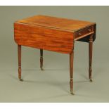 A Regency mahogany Gillows style Pembroke table, with end drawer and dummy drawer,