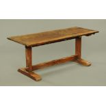 An Arts and Crafts oak refectory table,