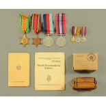 A Second World War group of medals, including miniatures to A J West,