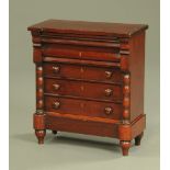 A Victorian mahogany miniature Scotch chest of drawers, with inverted breakfront,