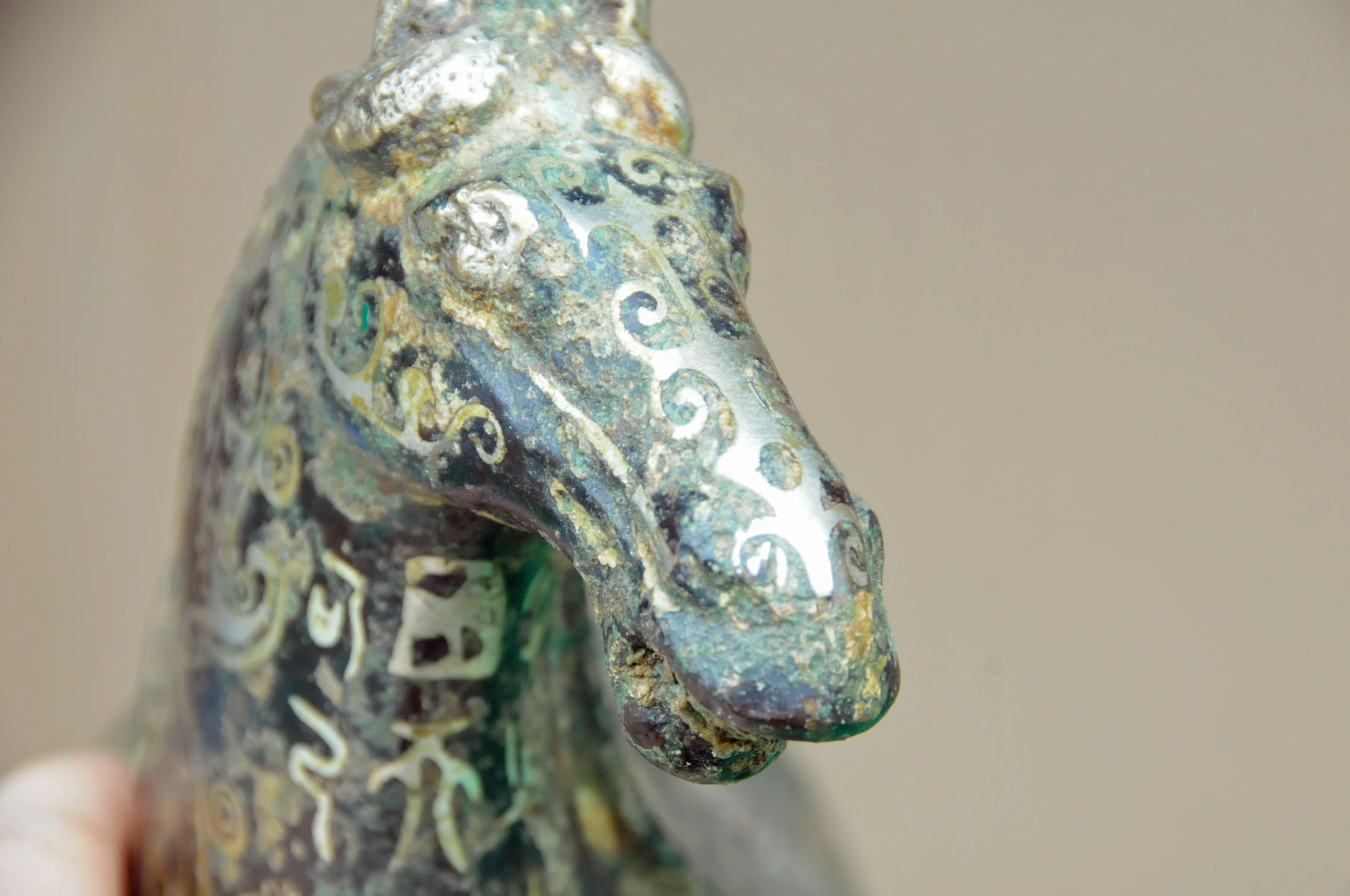 A Chinese bronze figure of a standing horse, with silver coloured metal inlay. Height 29. - Image 10 of 10