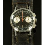 A vintage Breitling Cadette chronograph, stainless steel back, stamped 1302762 and 11551, manual,
