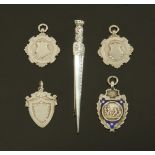 A Scottish silver dirk brooch, Edinburgh 1982 together with four silver fobs.