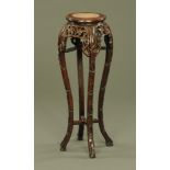 A 19th century Chinese hardwood jardiniere stand, with rouge marble top,