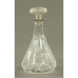 A silver mounted cut glass decanter with stopper, hallmark rubbed. Height 27 cm.