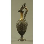 A 19th century Italian Grand Tour embossed bronze ewer,