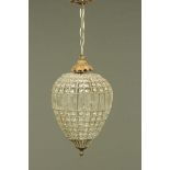 A circular strawberry shaped glass and metal chandelier, height excluding suspension chain 45 cm,