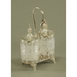 A 19th century American Rogers silver plated pickle set, with cut glass cylindrical jars.