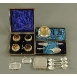 A set of six silver coffee spoons, Chester 1961, two decanter labels, serviette ring,