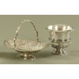 A Victorian silver plated fruit dish, together with a wine cooler.