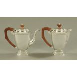 A silver coffee pot and matching jug, Birmingham mark 1936. 869 grams gross.