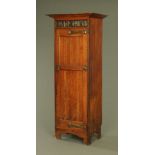 An Edwardian oak Art Nouveau wardrobe,