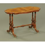 A Victorian walnut stretcher table,