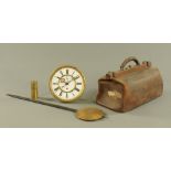 A Vienna regulator wall clock movement, with single weight and in Gladstone bag.