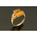 A 9 ct gold citrine ring, Size L.