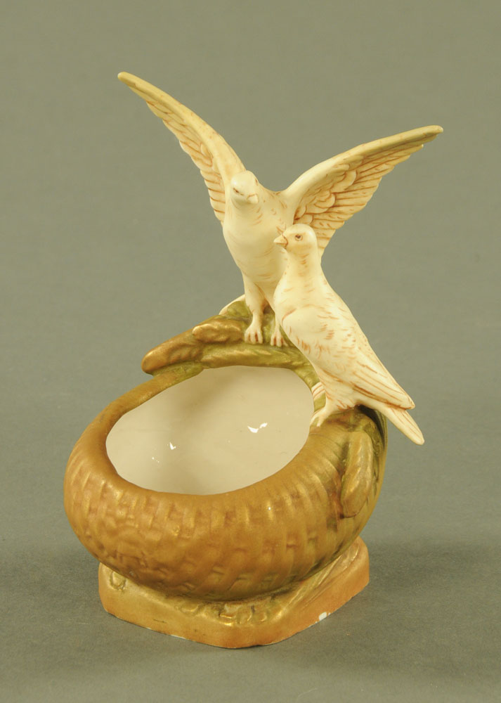 A Royal Dux bowl with doves, pink triangle mark to base. Height 17 cm.