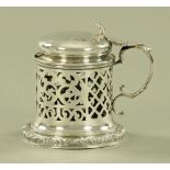 A Victorian silver preserve pot cover, Henry Manton 1855, 168 grams.