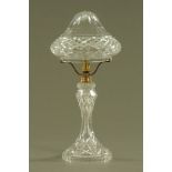 A cut glass table lamp with toadstool shaped shade. Height 53 cm, diameter 26 cm.