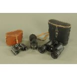 A pair of Viking 7 x 50 binoculars, cased together with a pair of Denhill 8 x 25 binoculars,