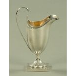 An Edwardian silver cream jug Birmingham 1904 maker William Adams Limited, 151 grams. Height 16 cm.