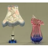 A vintage faceted glass table lamp with chrome fitting and blue glass base,