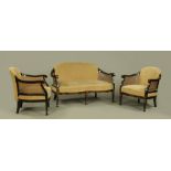 A chinoiserie black lacquered three piece bergere lounge suite, circa 1920,