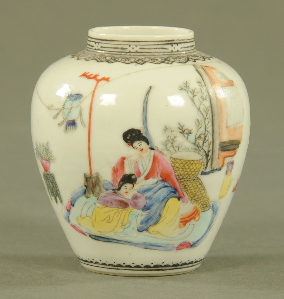 A small Chinese pot, polychrome decorated with figures and with rectangular seal mark to base.