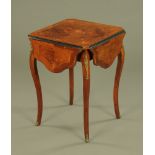 An early 20th century Continental marquetry four drop flap occasional table,