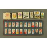 A collection of Kensitas silks, together with a quantity of cigarette cards.