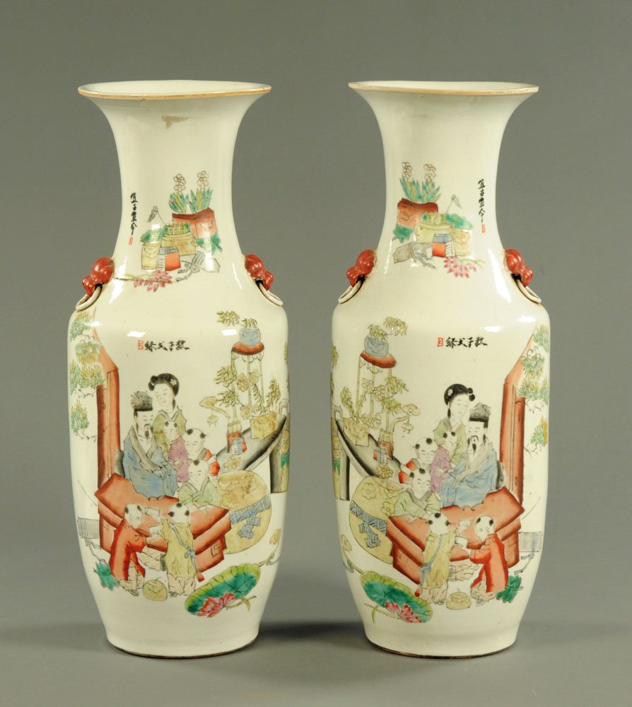 A large pair of Chinese polychrome vases, with numerous character marks and figures.