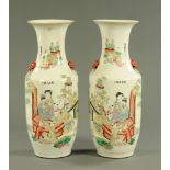 A large pair of Chinese polychrome vases, with numerous character marks and figures.