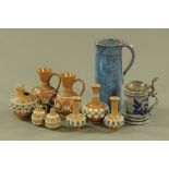Eight pieces of Doulton silicon ware, a beer stein and a studio pottery jug. Tallest 21.5 cm.