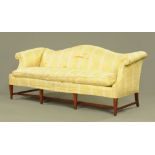 A Hepplewhite style settee, with arched back,