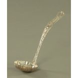 An early 20th century American cast silver punch ladle by Tiffany & Co, of Art Nouveau design,