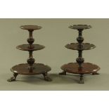 A pair of Edwardian mahogany tabletop three tier circular miniature waiters.