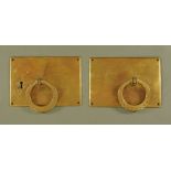 Two large brass Arts and Crafts door handles, 16 cm x 23 cm.