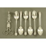 A pair of Georgian silver sugar nips and six silver teaspoons, Sheffield mark 1929. 117 grams.