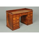 A Victorian mahogany kneehole desk,